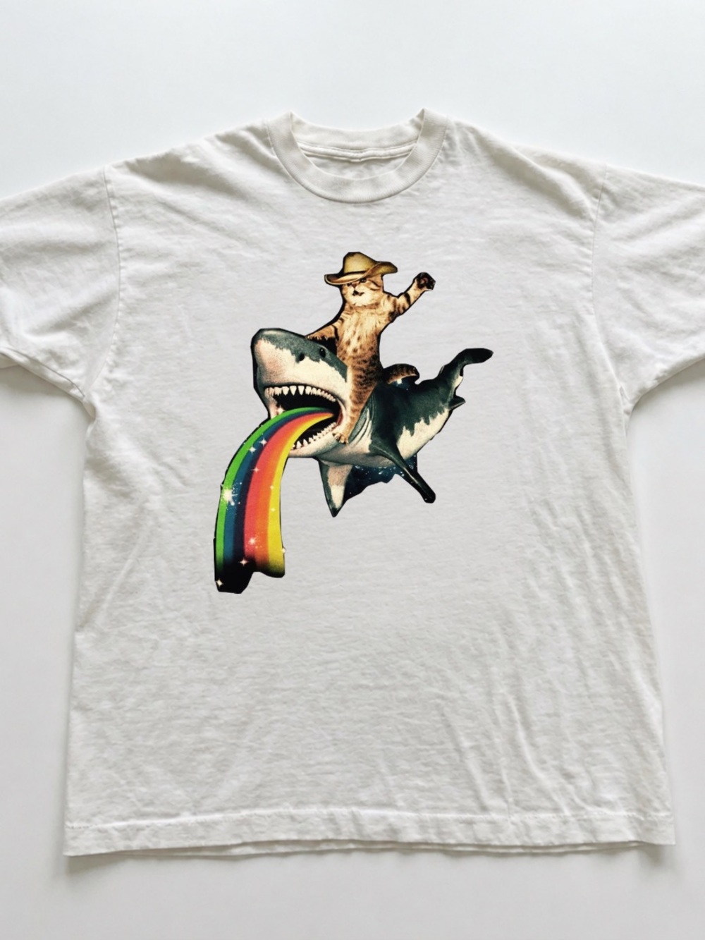 White Short-Sleeve Tee with Cowboy Cat Riding Shark Graphic